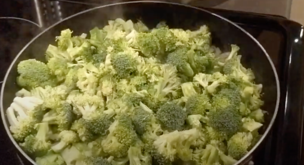 Frying the Broccoli for the Govinda Dasu Recipe